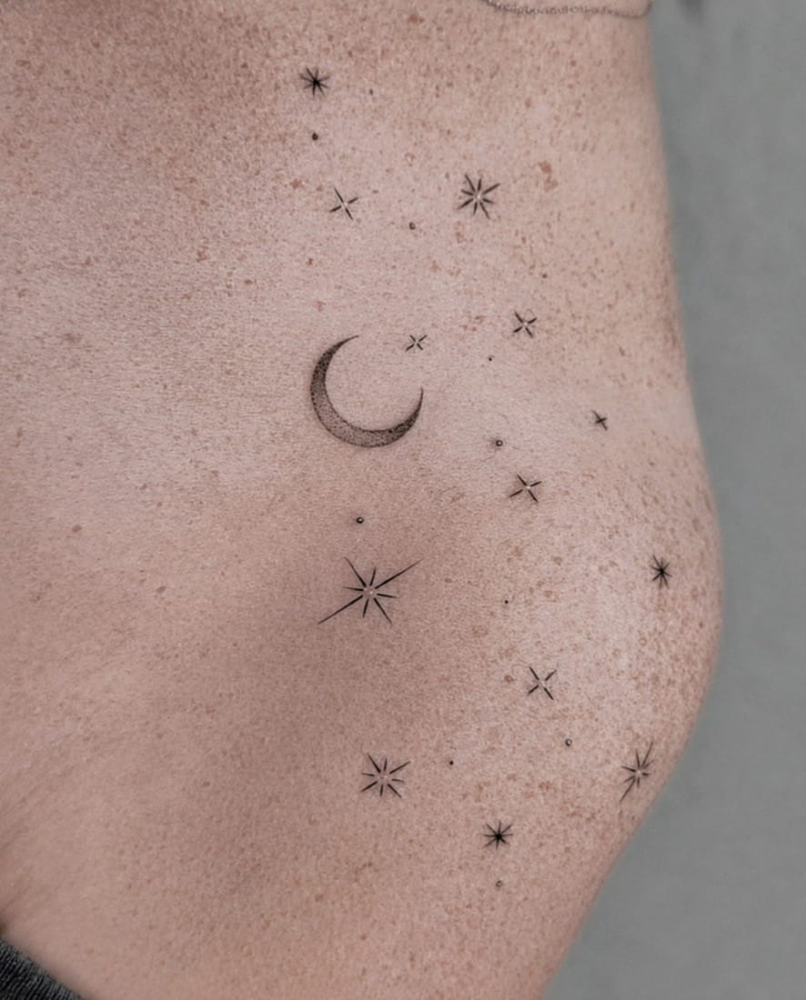 Fine line crescent moon and stars dotwork tattoo by a London Fine Line Tattoo Academy student